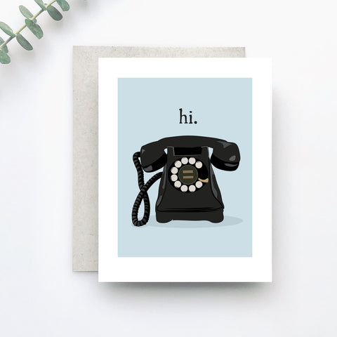 Illustration of a vintage rotary phone with the greeting "hi' above the image